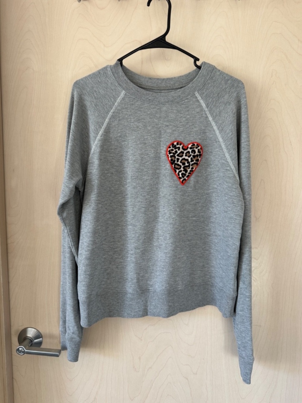 The Stella & Dot Dress for Success Sweatshirt is a stylish and comfortable activ